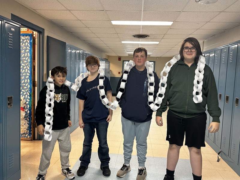 Students work and decorate doors at LMS.