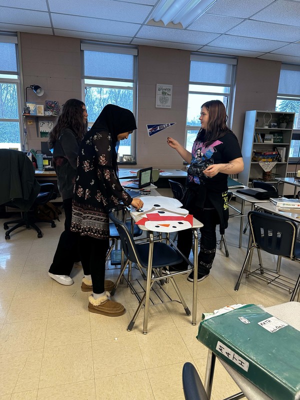 Students work and decorate doors at LMS.