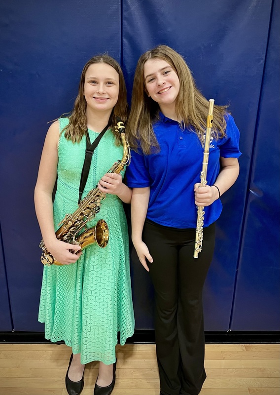 Students pose with instruments