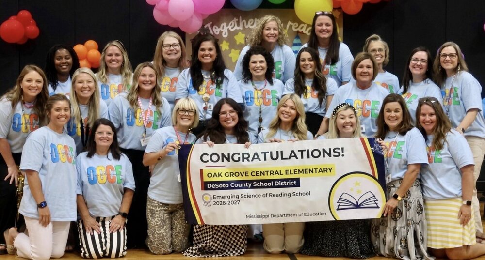 OGCES Staff and Their Banner