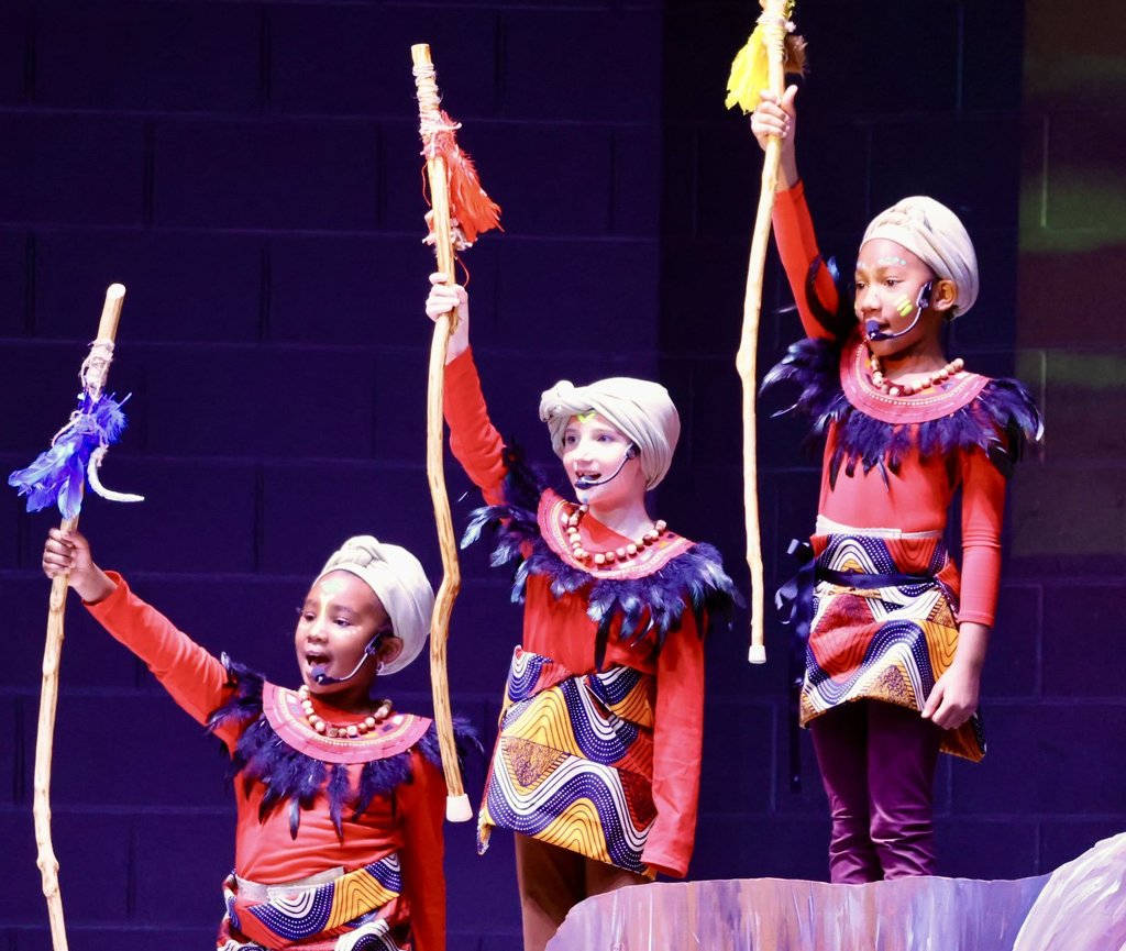 Students performing lion king 1