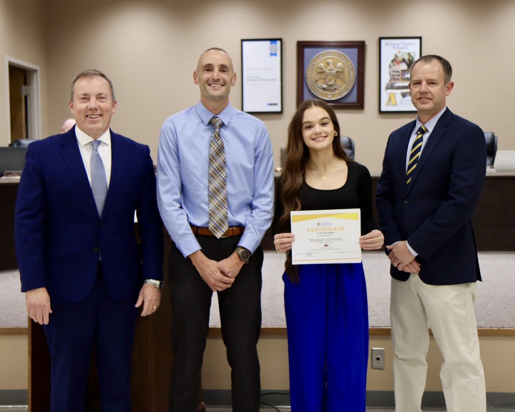 OBHS Principals and student smiling