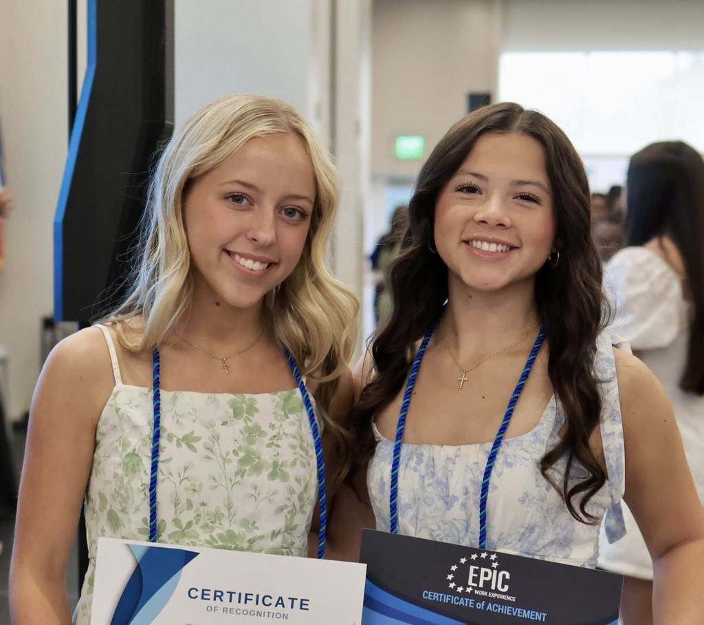 2 students smiling for the camera