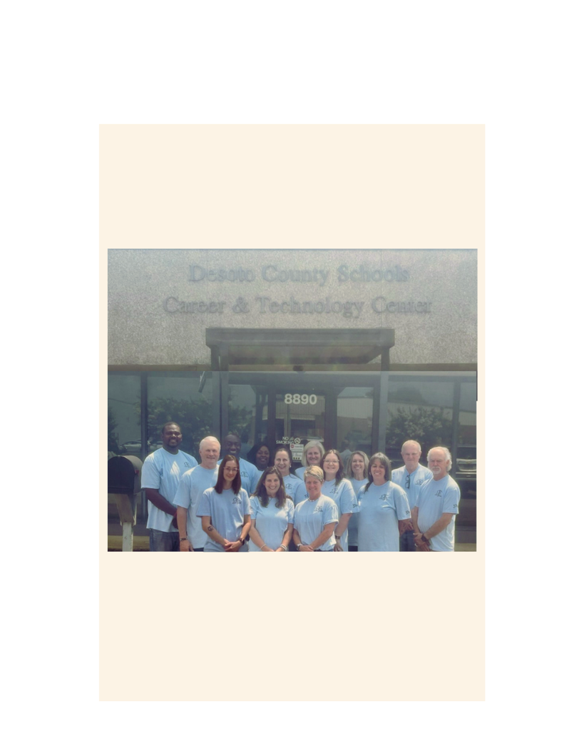 Staff standing in front of CTCE building