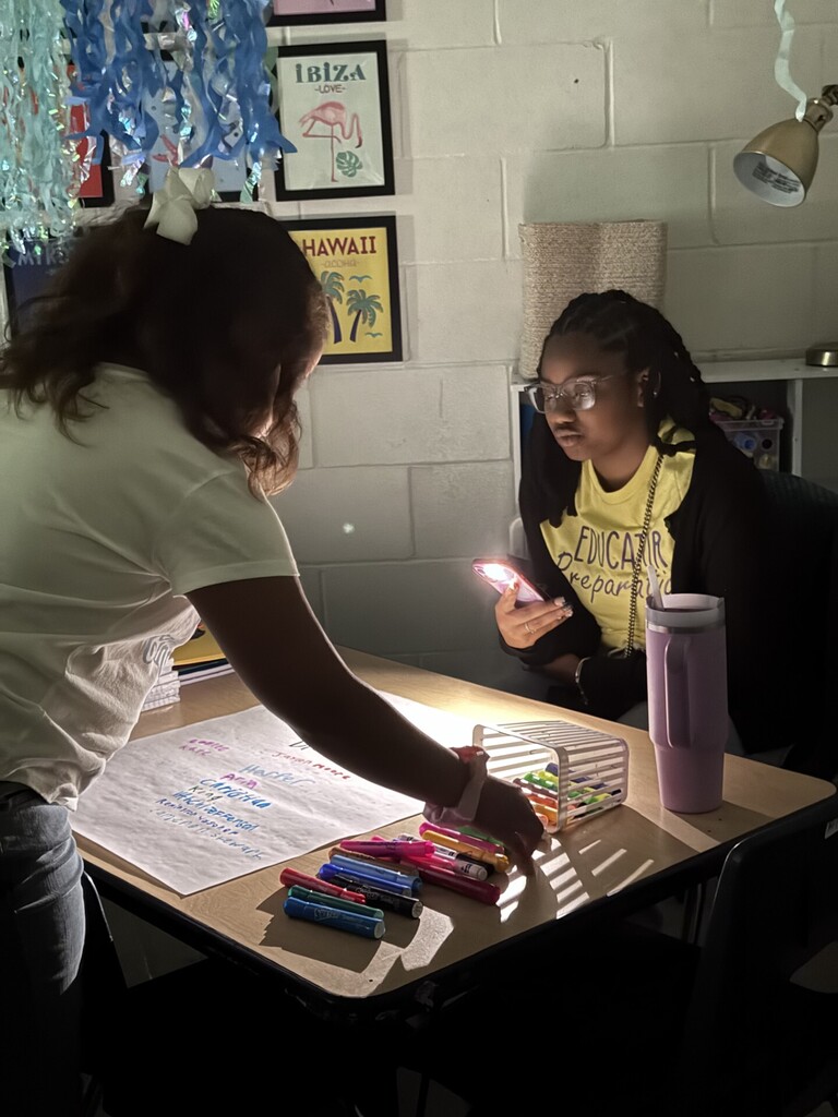 two students working at a desk