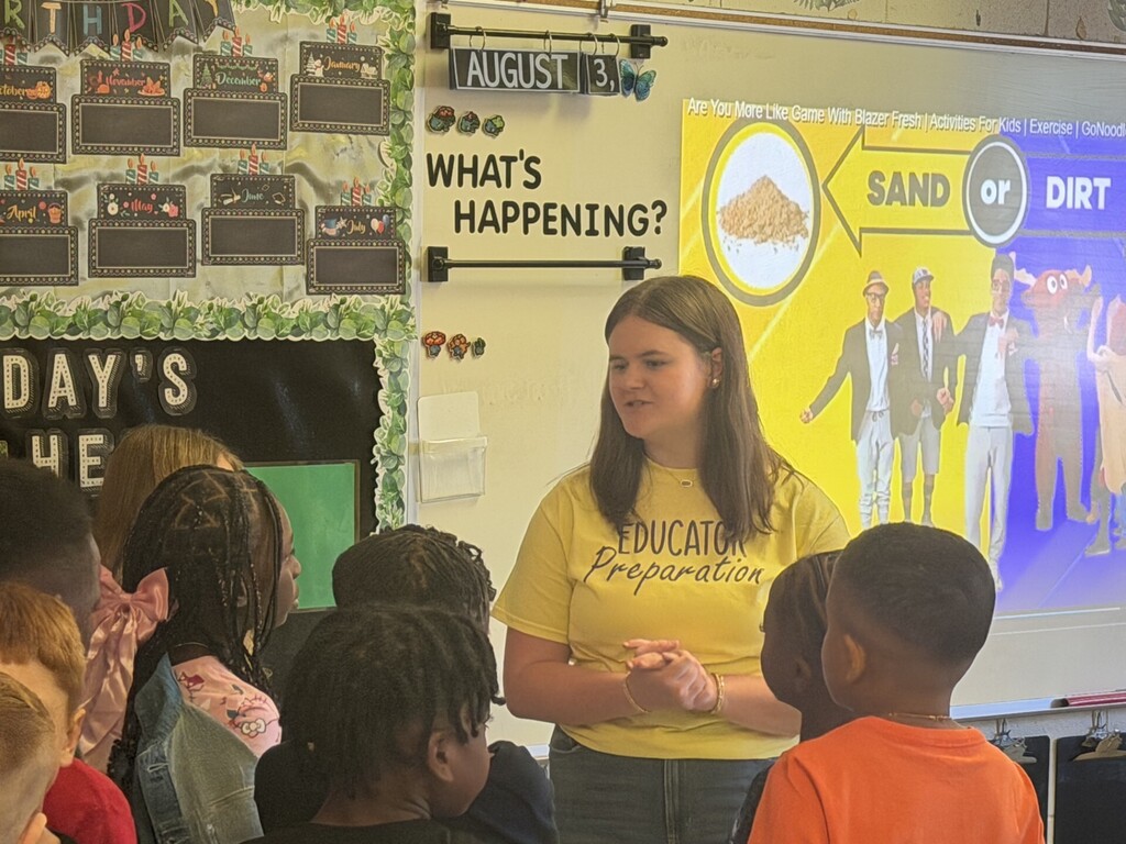 ed prep student talking to elementary age kids