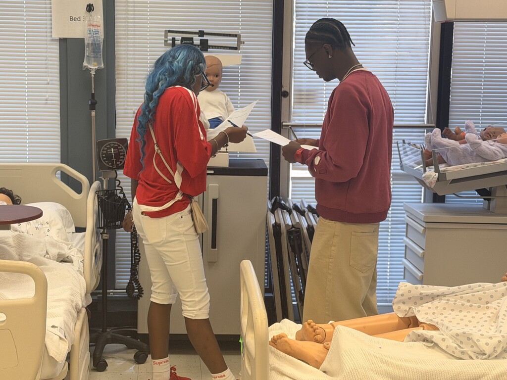 two students looking at a checklist