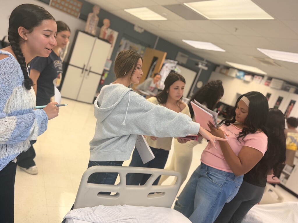 students gathering in medlab