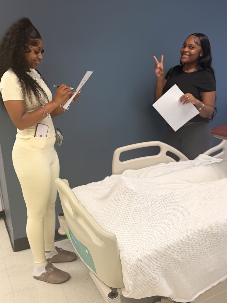 two students looking at a checklist