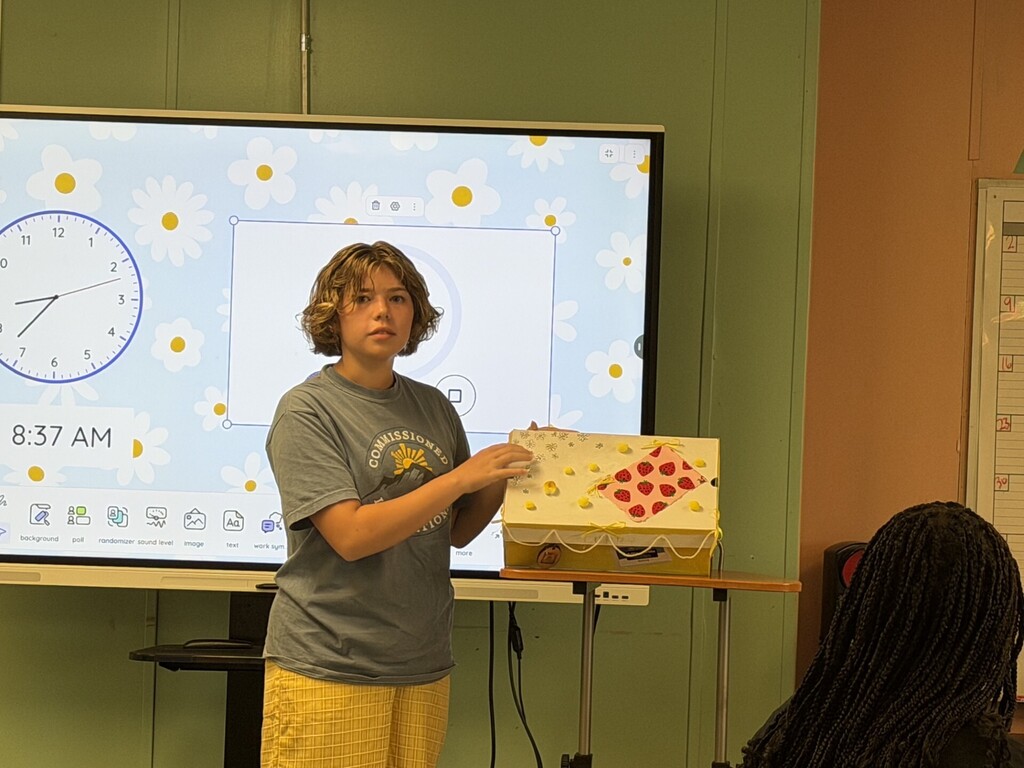 student giving presentation