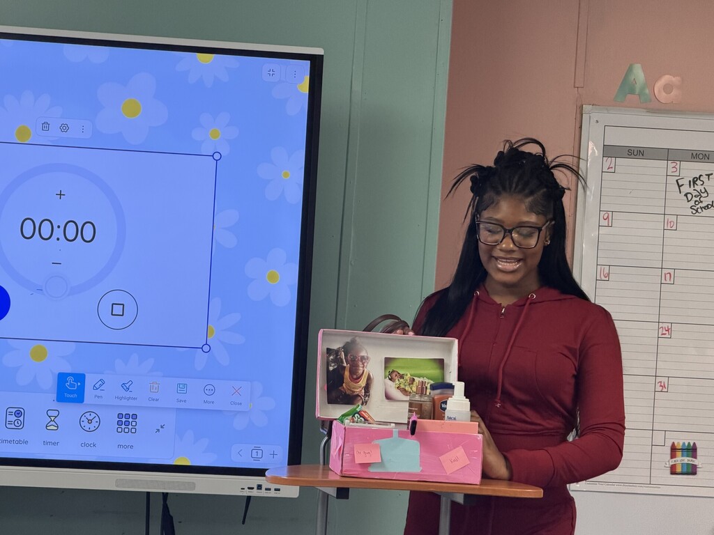 student giving presentation