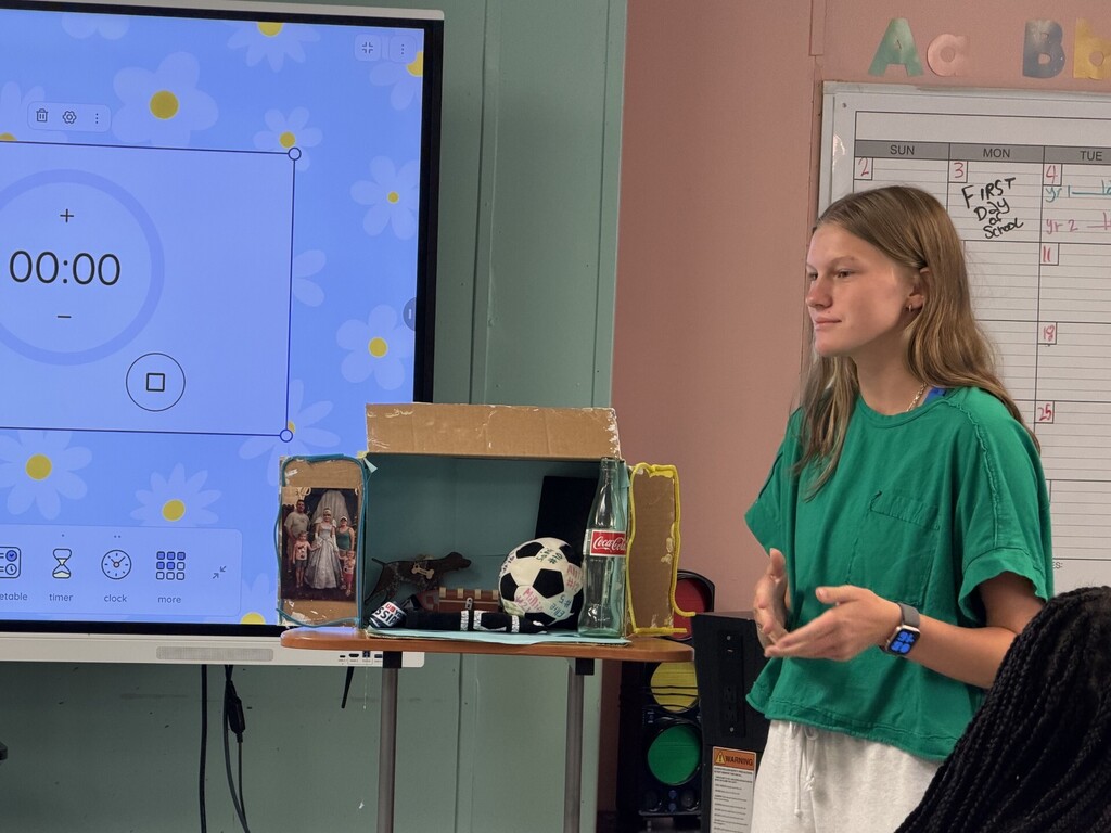 student giving presentation