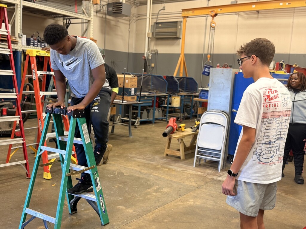 student on ladder learning ladder safety