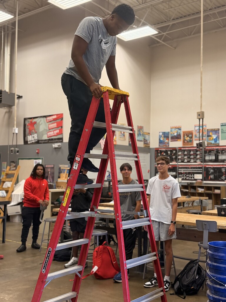 student on ladder learning ladder safety