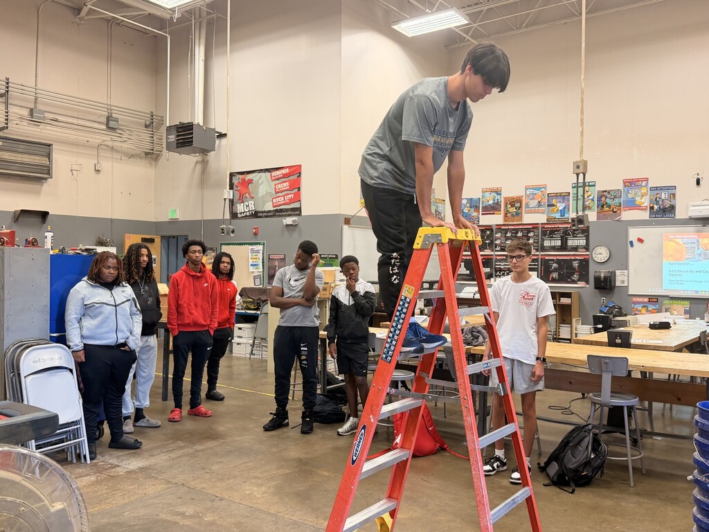 student on ladder learning ladder safety