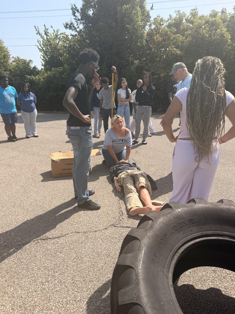 fire science students practicing extricating