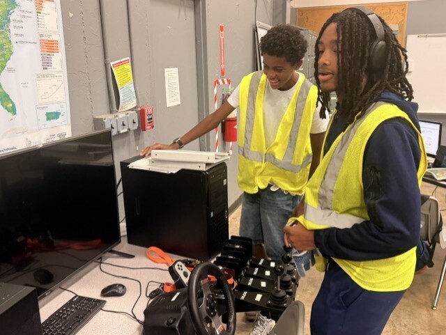 two students looking at a computer