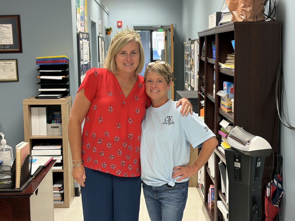 Ms Morris and Ms David posting for a birthday photo