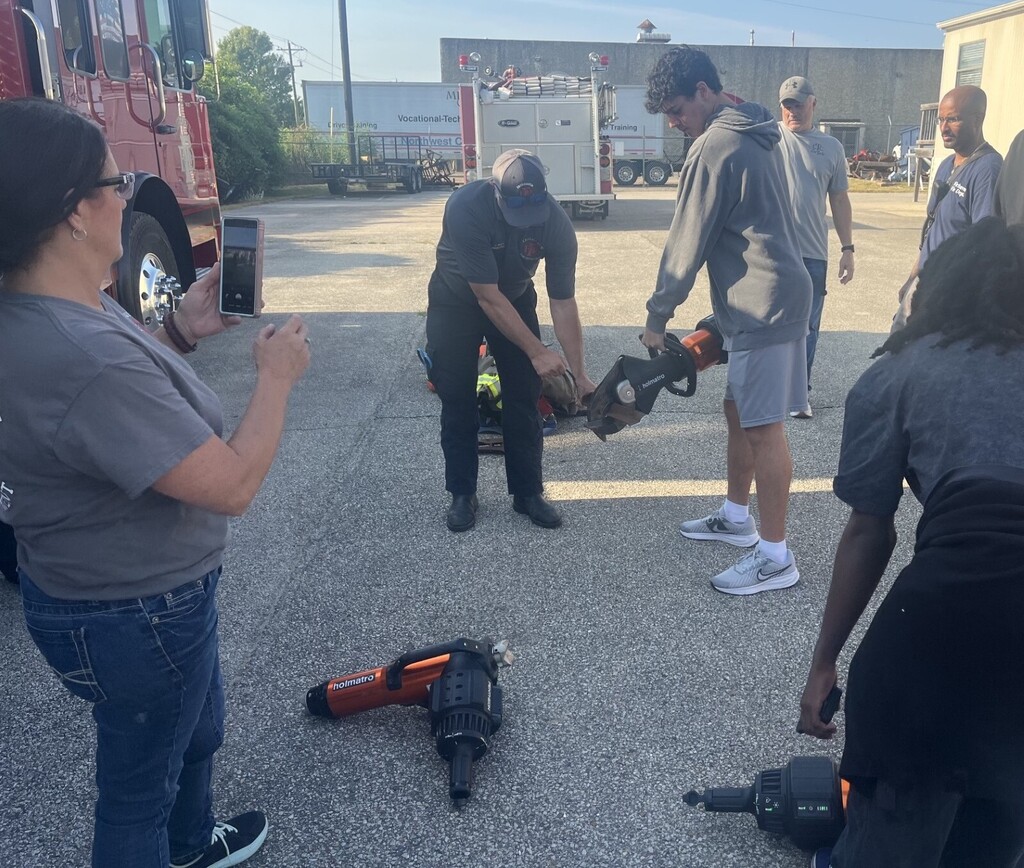 student learning how to use jaws of life