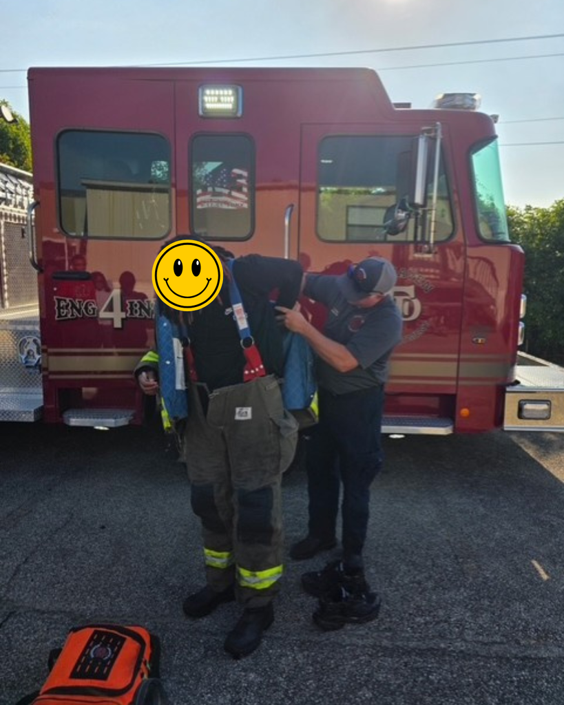 student geared up in fire suit