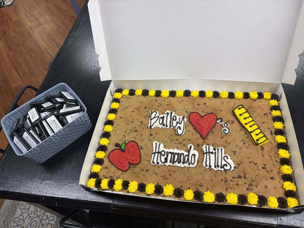Bailey congratulates HHES cookie cake