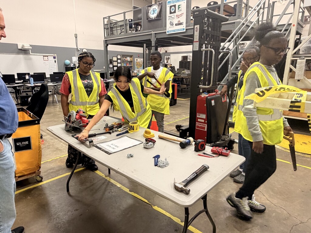 students learning about different tools
