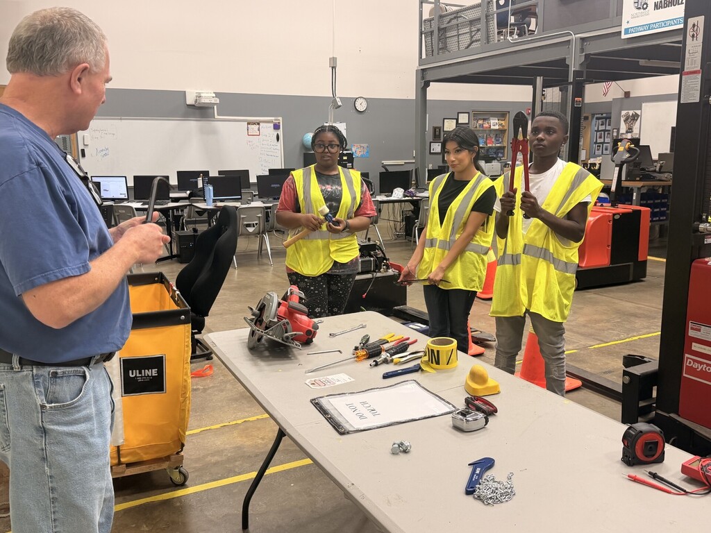 students learning about different tools