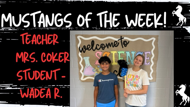 Red text says, “Mustangs of the Week Teacher- Mrs. Coker and Student - Wadea R.” Shows Mrs, Coker holding a black Mustang on a stick standing next to Wadea. They are in front of a Welcome to Science sign.