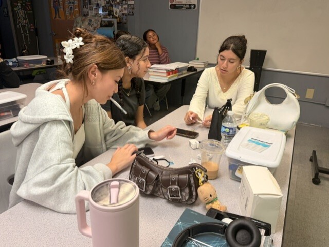 students practicing taking vitals