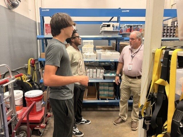 students giving program tour