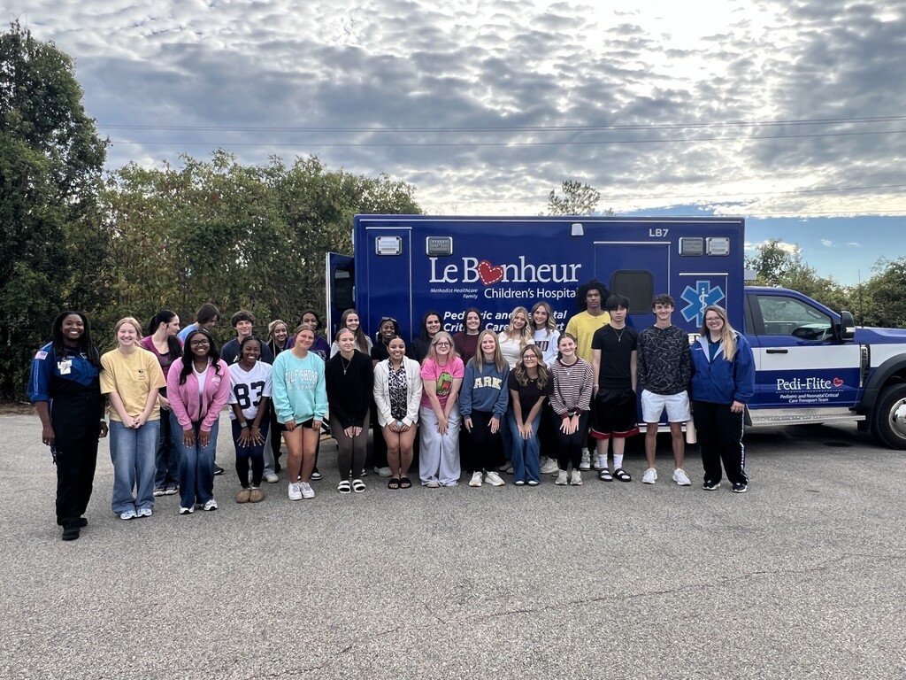 group picture with ambulance