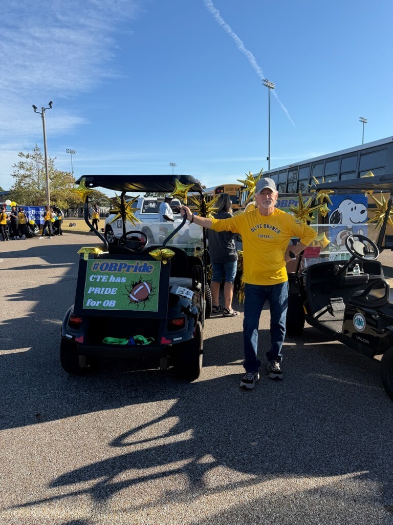 mr woods with golf carts