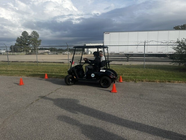 students parallel parking golf cart 