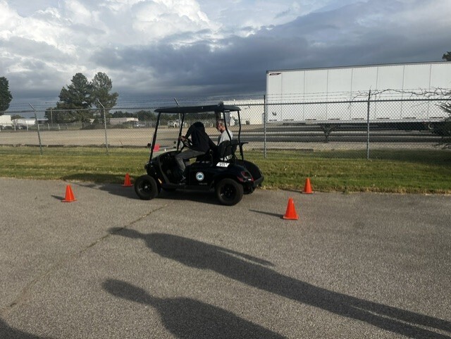 students parallel parking golf cart 