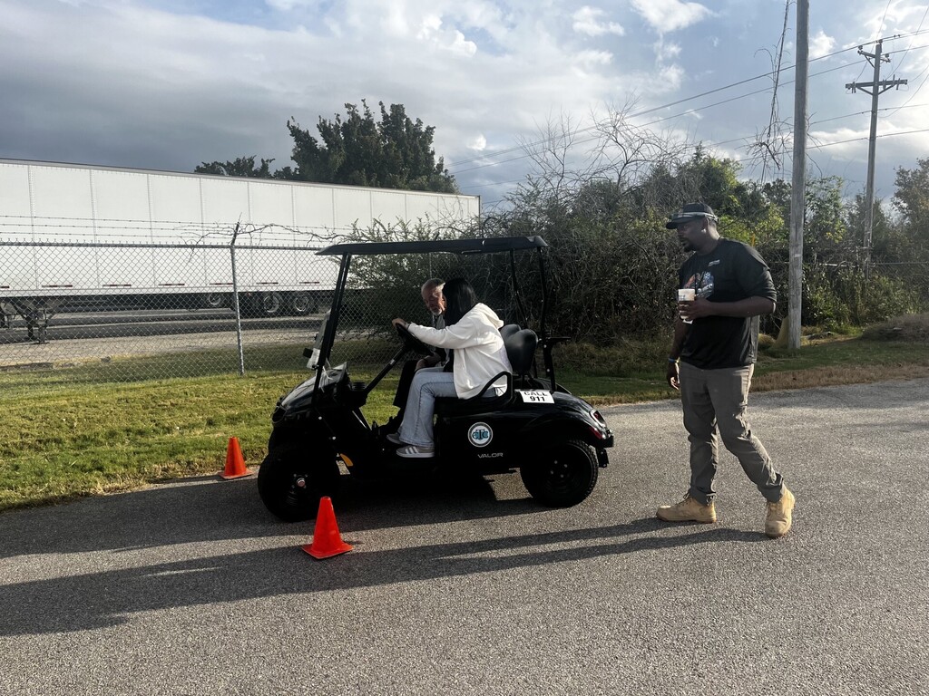 students parallel parking golf cart 