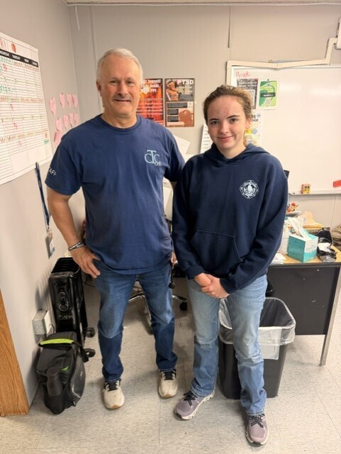former student visiting teacher and class