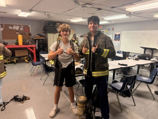 students with fire gear on
