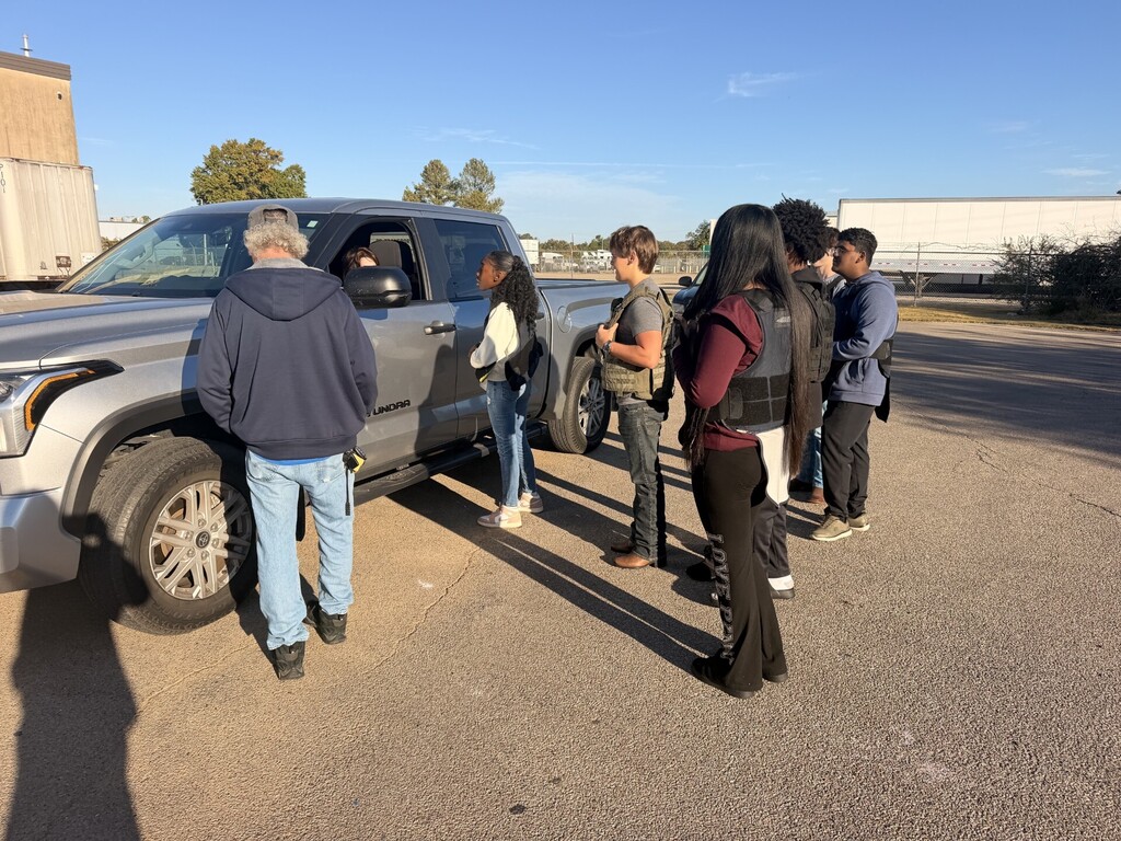 students outside practicing traffic stops