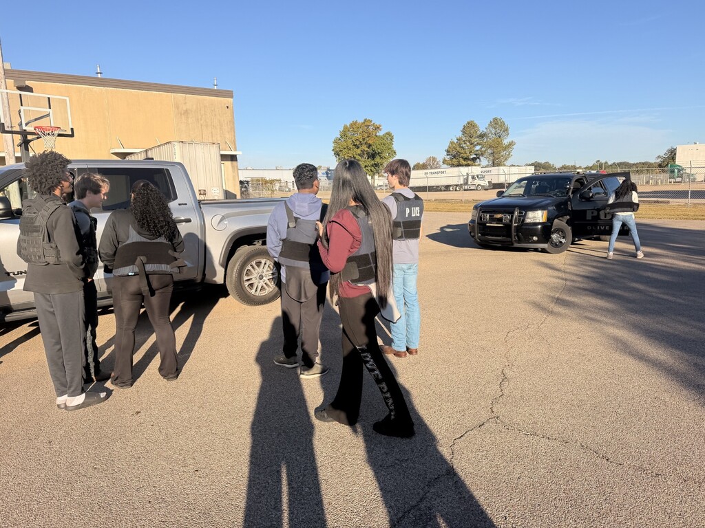 students outside practicing traffic stops