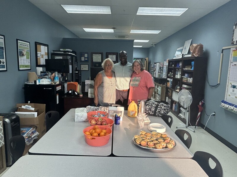 Mr. Miller receiving breakfast for the staff