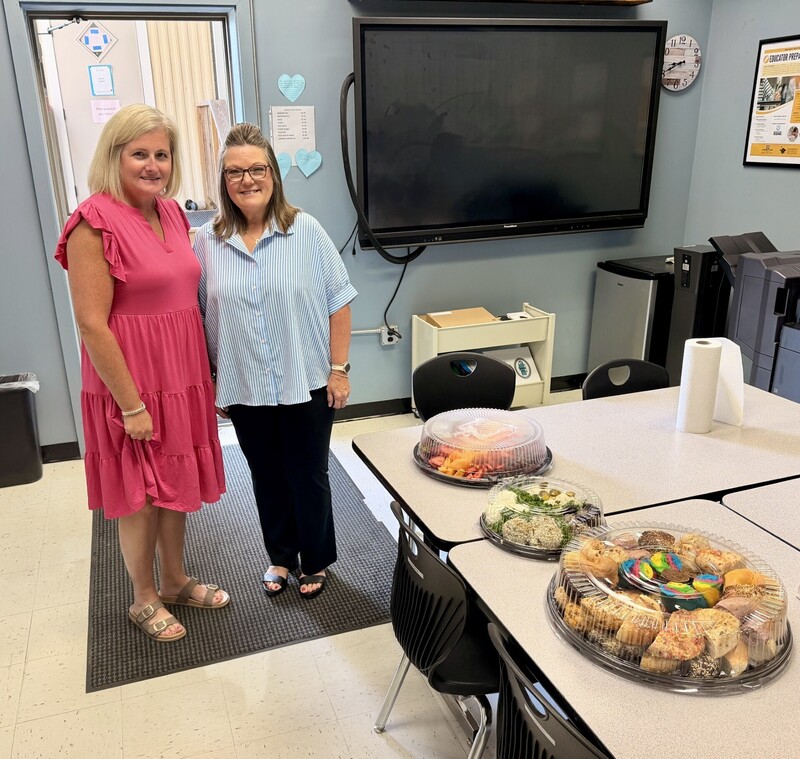 Mrs. Morris receiving breakfast for the staff