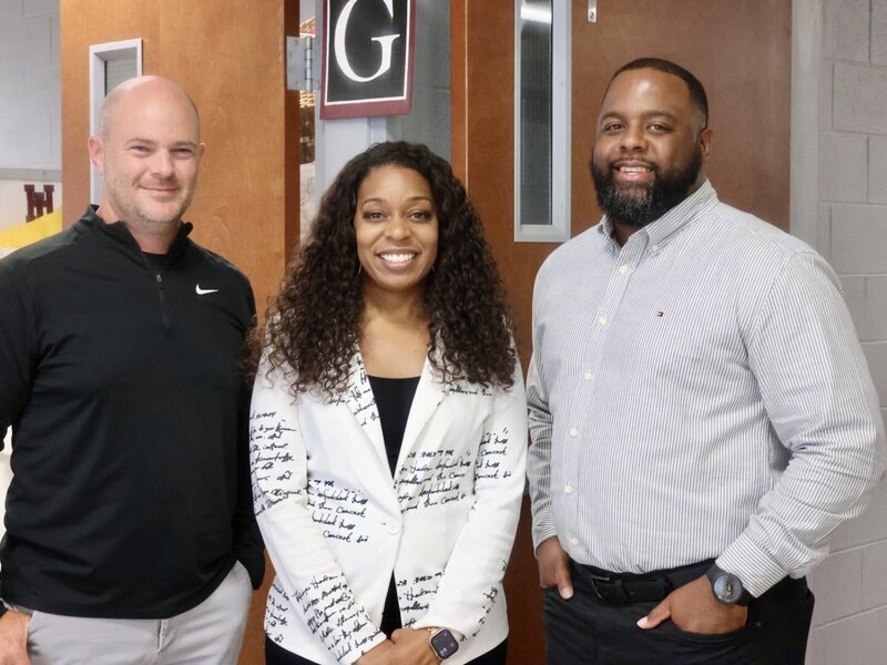 Administrators smiling