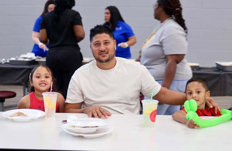 farther with family at table