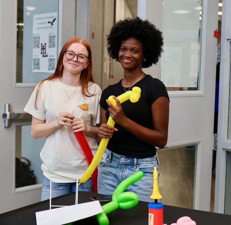 students with balloons