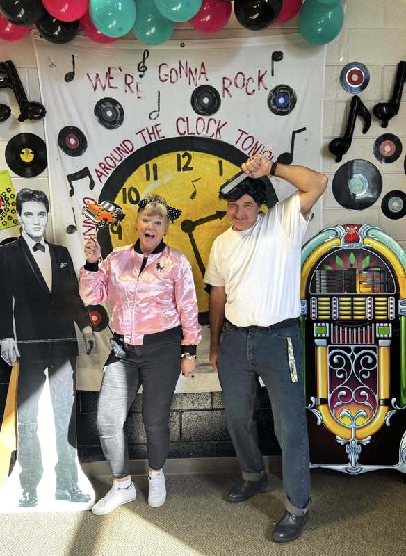 2 teachers posing for the camera