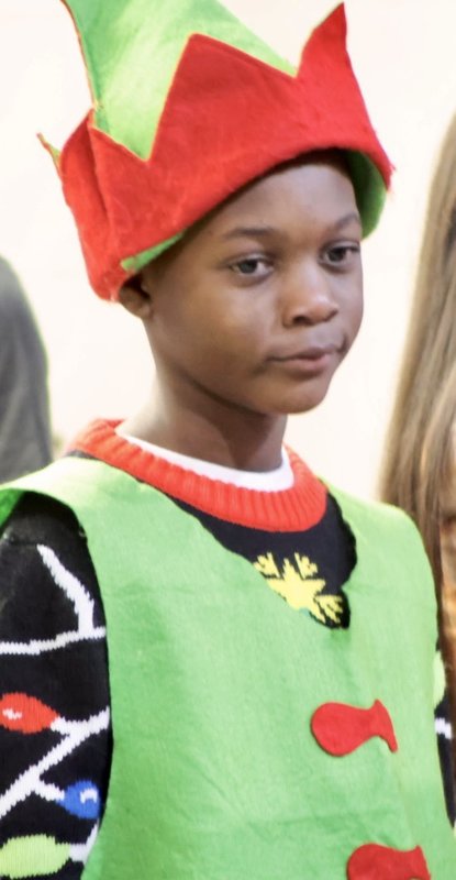 Student in Christmas outfit