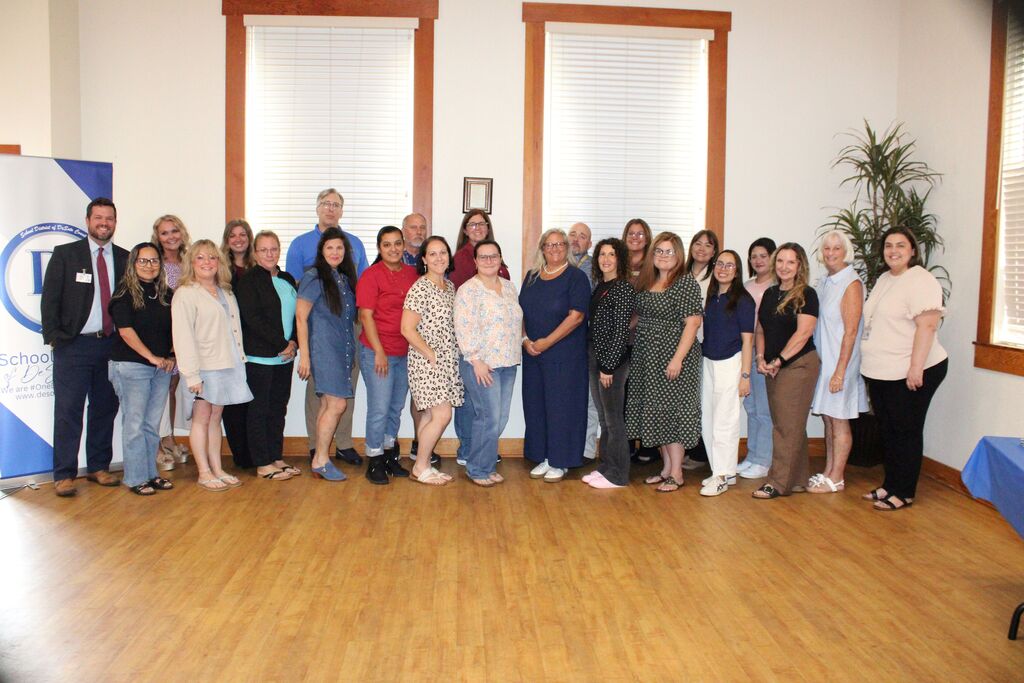 group of educators posing for a photo