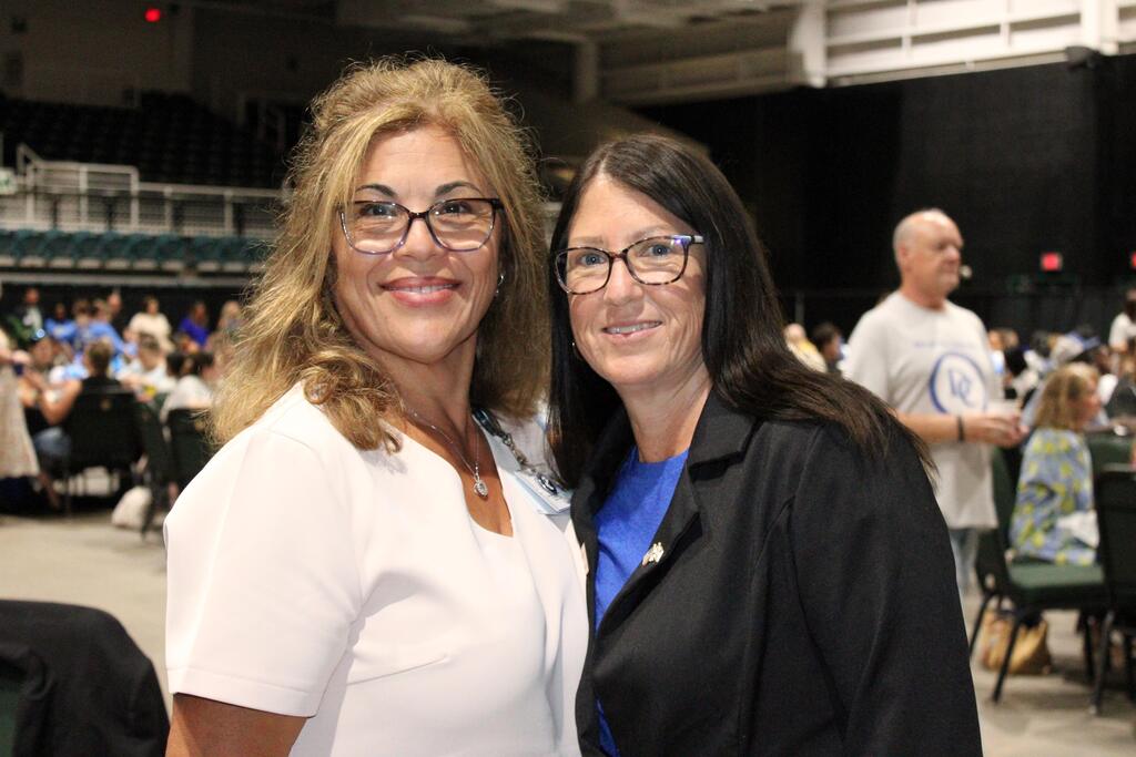 two women smiling