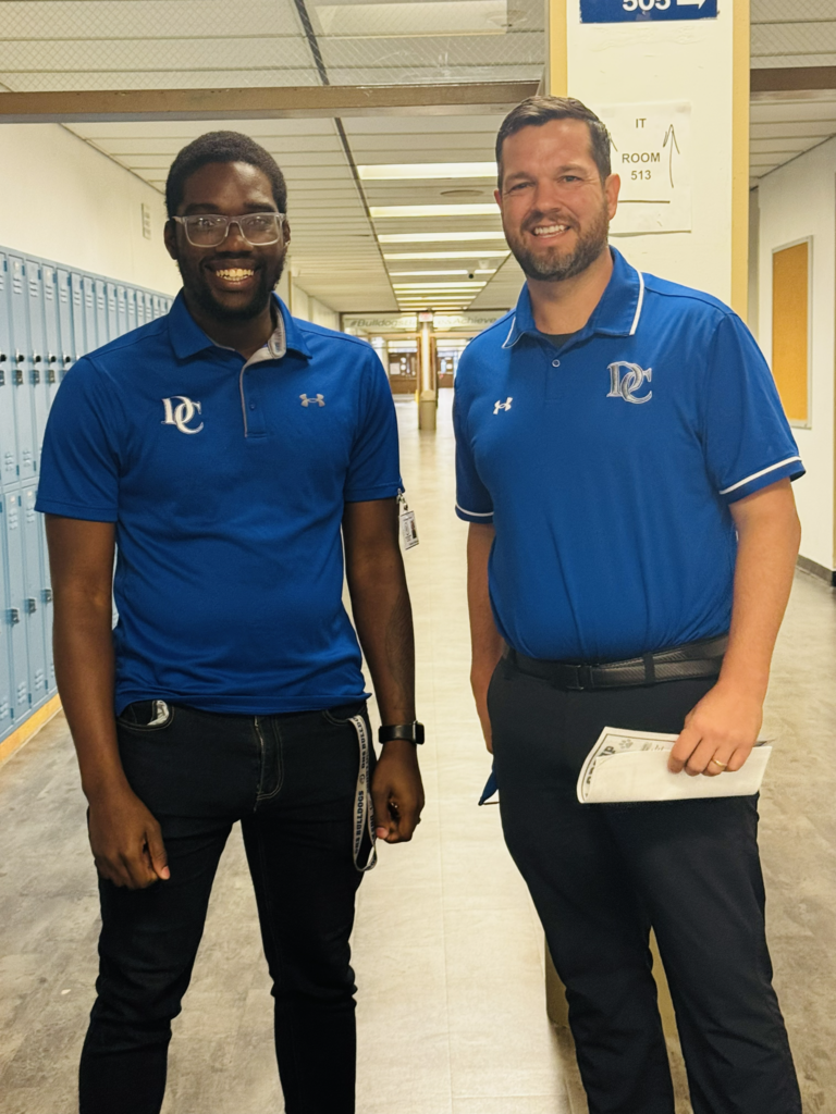two men smiling