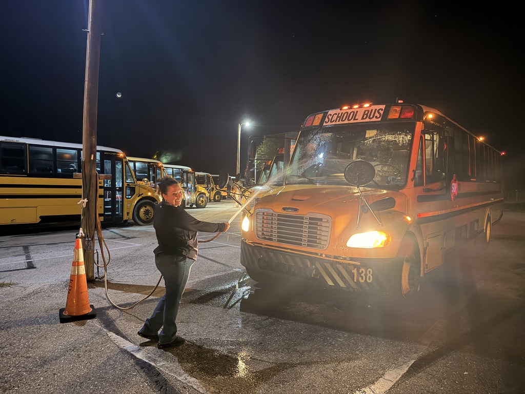lady cleaning school bus